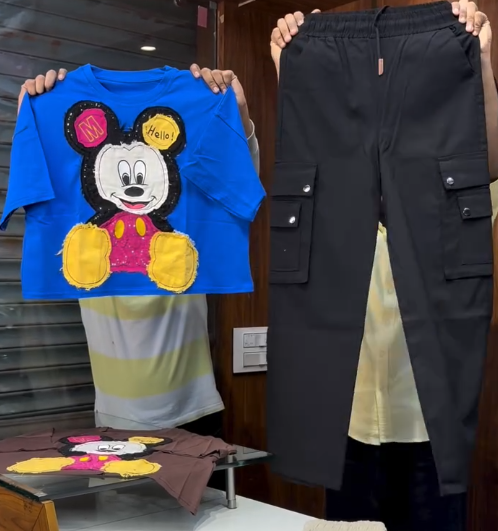 Playful Street Edge: Blue Mickey Mouse Graphic T-Shirt with Black Cargo Pants