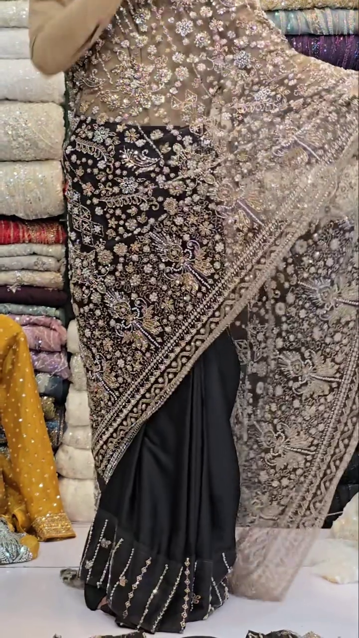 Midnight Glamour: Black Designer Saree with Intricate Embroidery and Sheer Sequin Drape