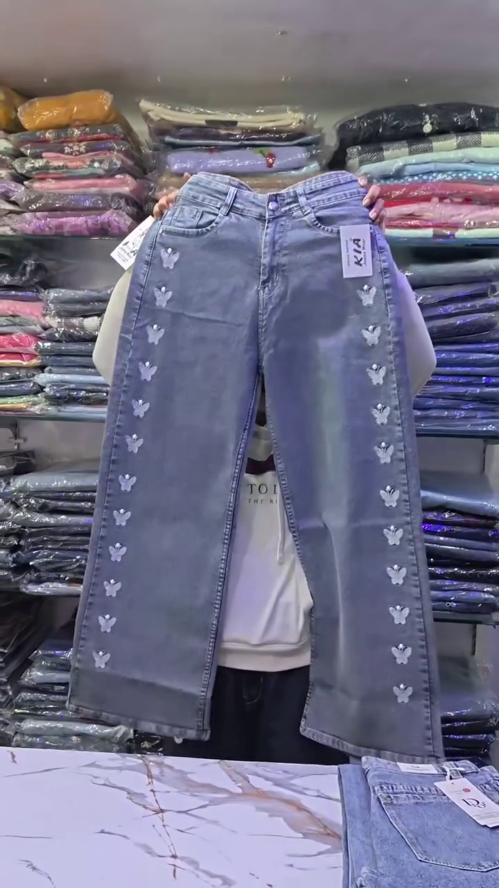 Playful Chic: KIA Wide-Leg Blue Denim Jeans with Butterfly Embellishments