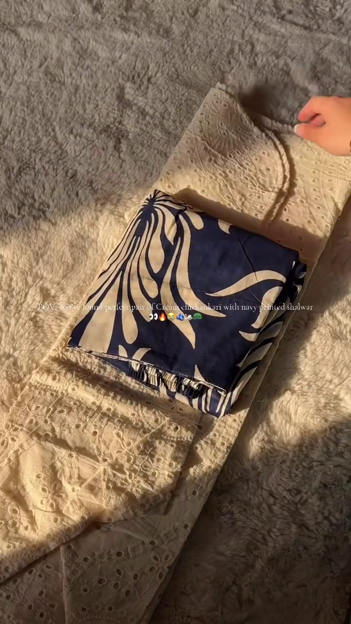 Chic Contrast: Navy Blue Patterned Side-Split Bottom with Cream Embroidered Top