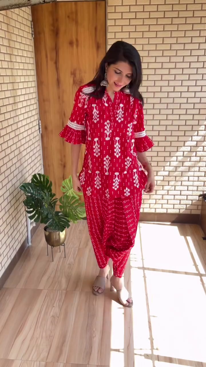 Chic Harmony: Pink Sleeveless Halter Neck Top with Matching Wide-Leg Trousers