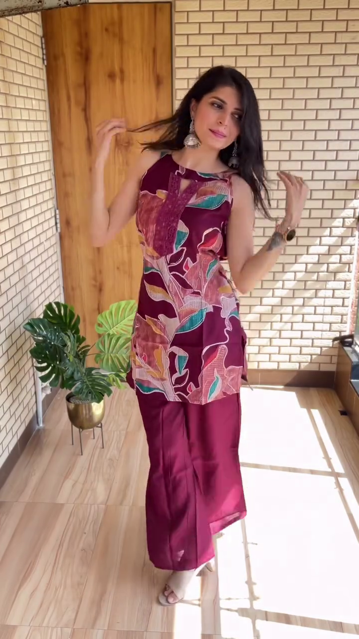 Chic Harmony: Pink Sleeveless Halter Neck Top with Matching Wide-Leg Trousers