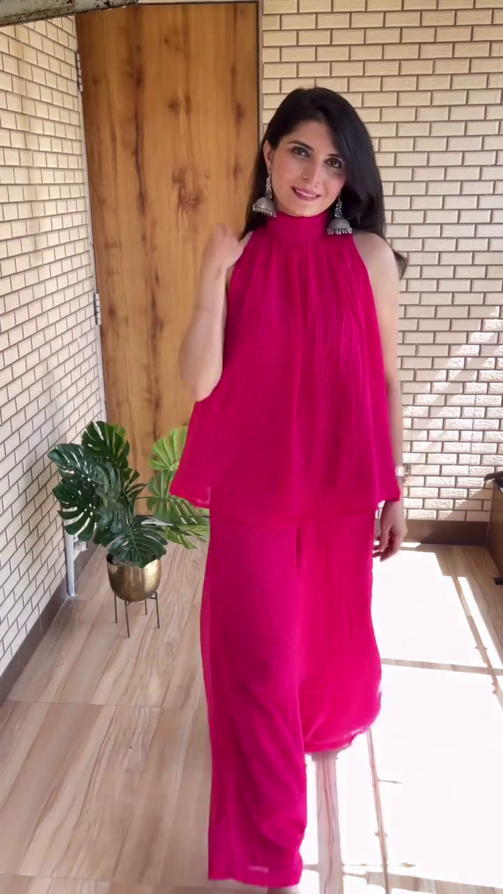 Chic Harmony: Pink Sleeveless Halter Neck Top with Matching Wide-Leg Trousers