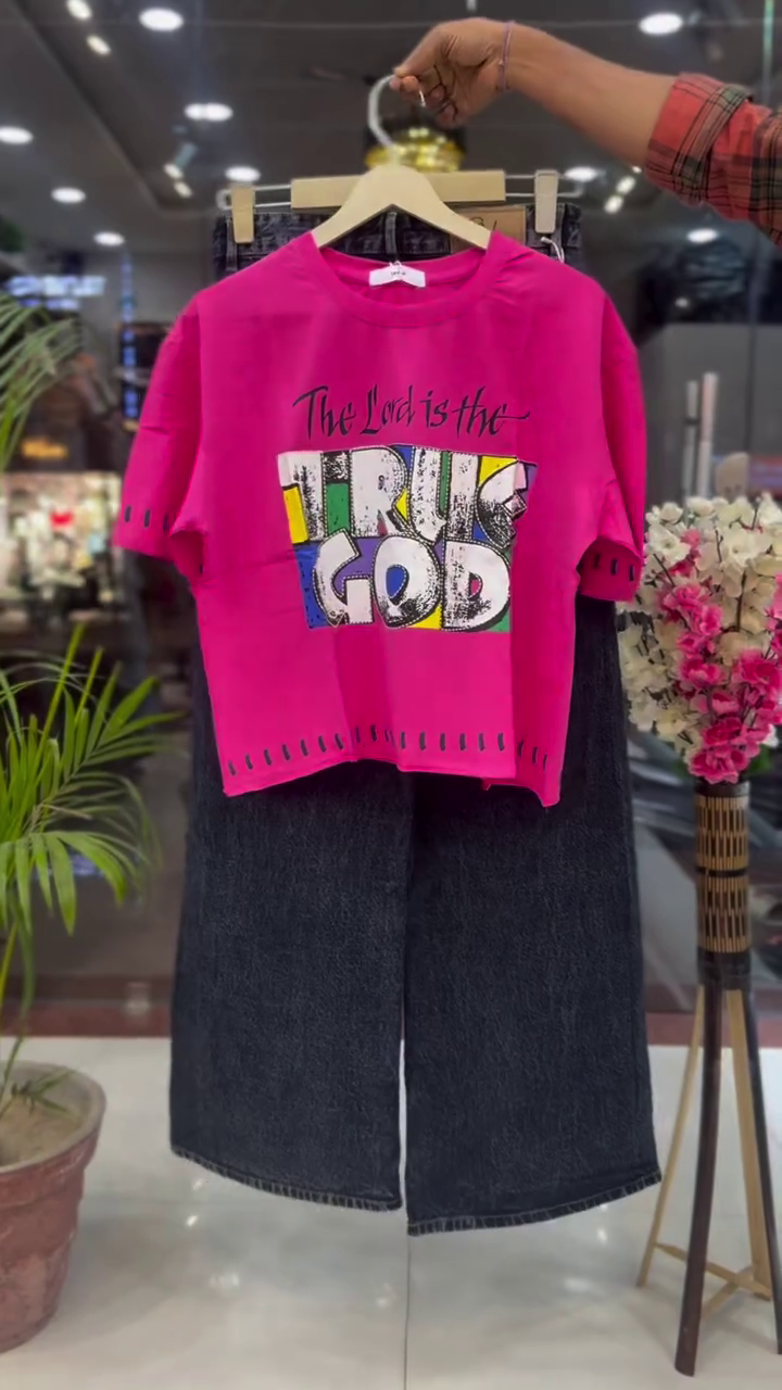 Urban Edge: Hot Pink Graphic T-Shirt with Wide-Leg Black Denim Jeans