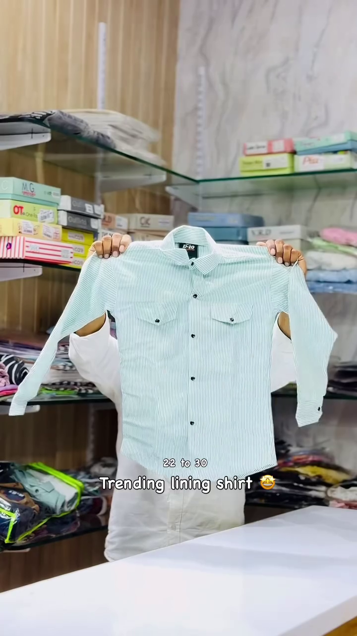 Classic & Crisp: Light Blue and White Vertically Striped Long-Sleeved Shirt