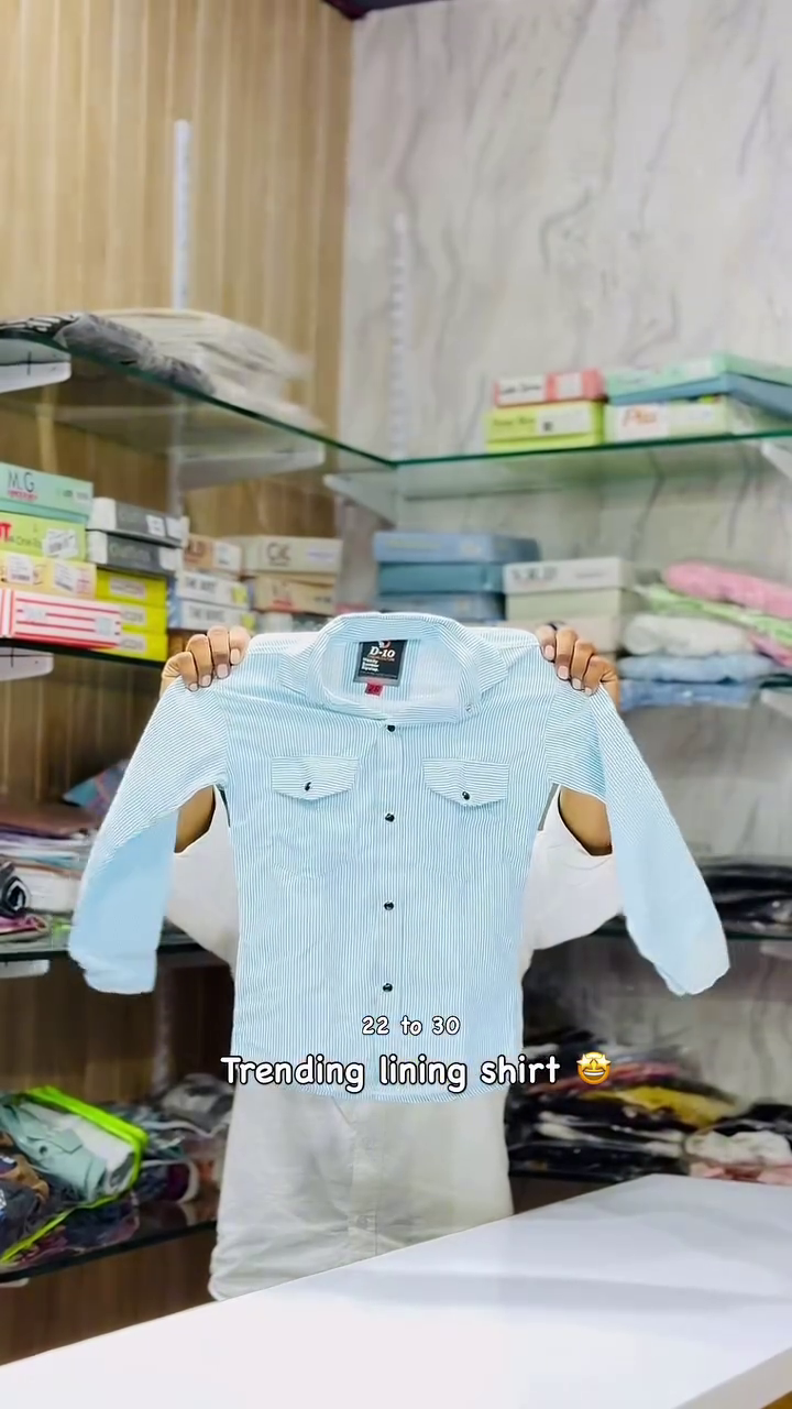 Classic & Crisp: Light Blue and White Vertically Striped Long-Sleeved Shirt