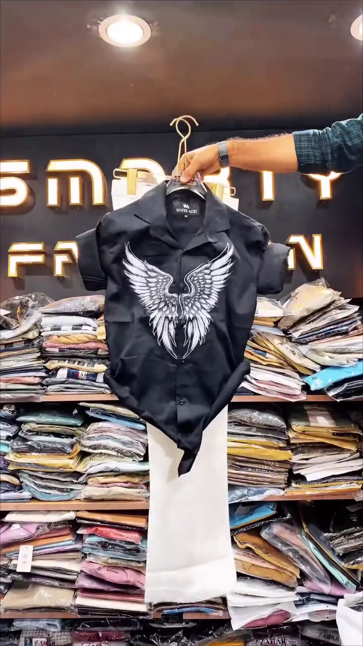 Chic & Modern: White Short-Sleeve Shirt with Black Graphic and Trousers