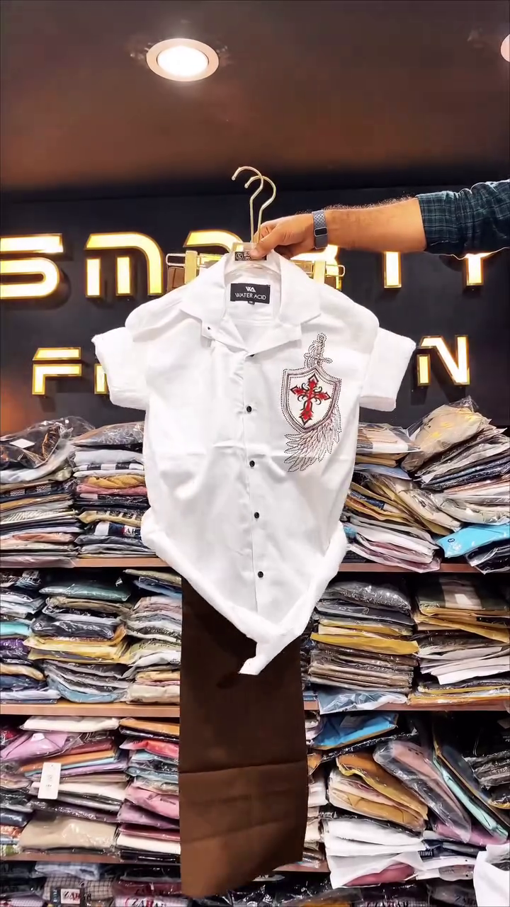 Chic & Modern: White Short-Sleeve Shirt with Black Graphic and Trousers