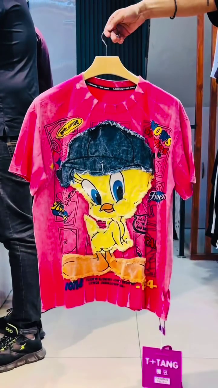 Fun & Playful: Pink Looney Tunes Tweety Bird Graphic T-Shirt