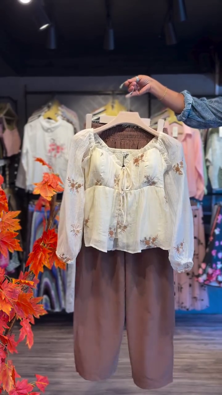 Elegant & Effortless: Cream Floral Top with Brown Trousers